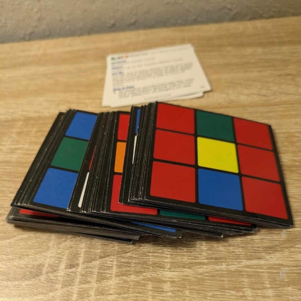 Rubiks Battle Card Game in Collector Tin University Games 2-6 Players Ages 7+ - Picture 14 of 14